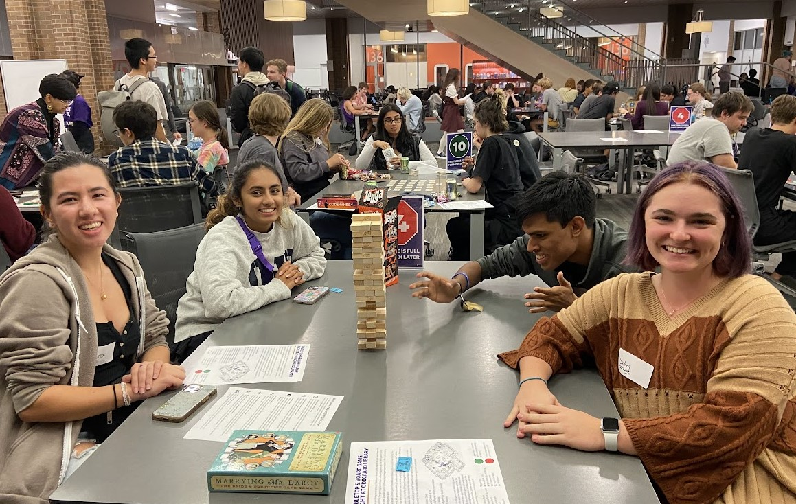 Group of students playing Jenga
