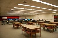 the old testing area with small tables, not all with computers