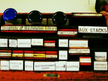 Photo of a variety of UW Libraries property stamps, photo courtesy of Curtis Cronn