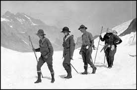 Alt text: climbers in snow- The Mountaineers Summer Outing, July 31 - August 21, 1920, The Olympics