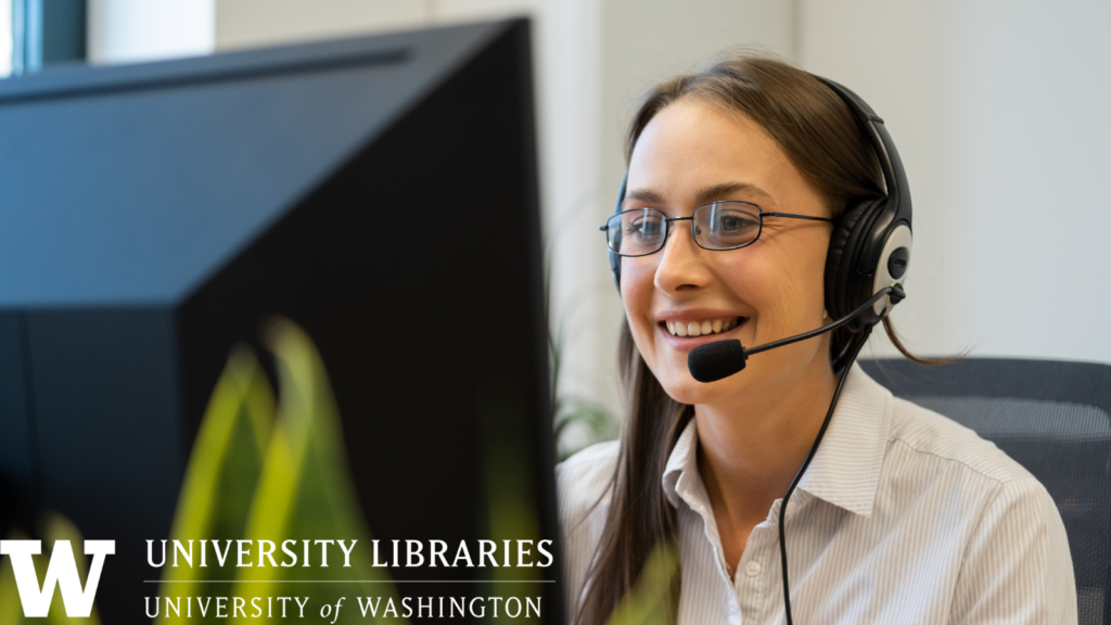 image: person with headset looking at computer