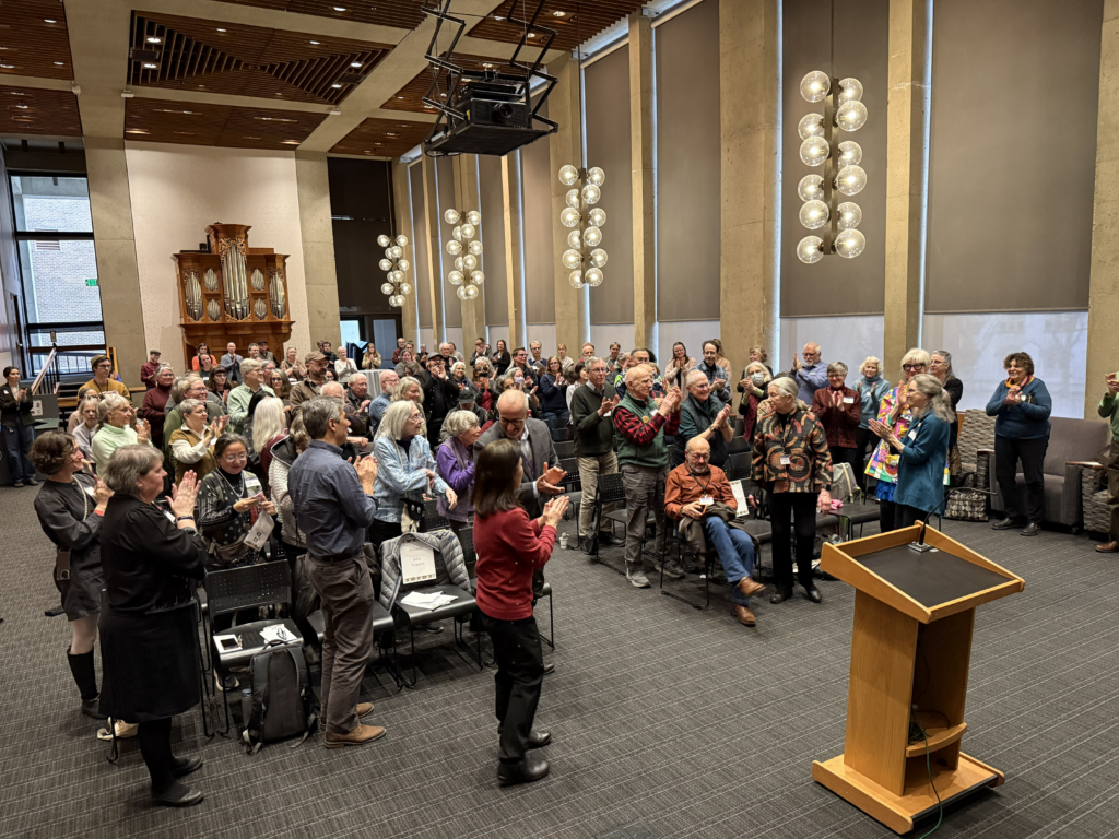Image: photo from event of people clapping