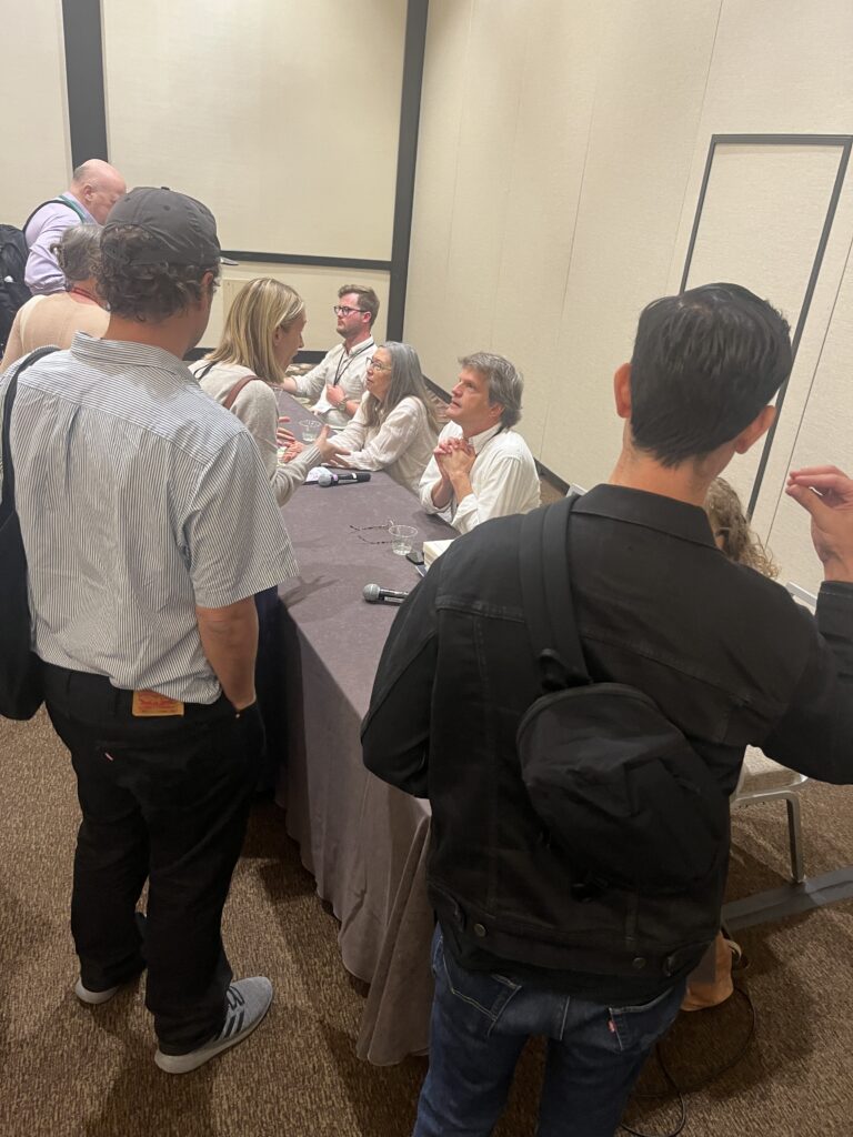 Local booksellers talking to attendees after a panel on press–bookstore partnerships 