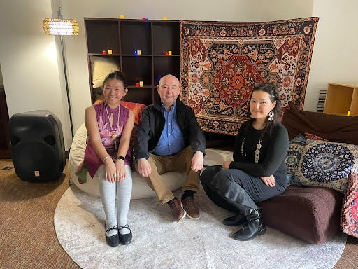 3 people posing in the seminar room