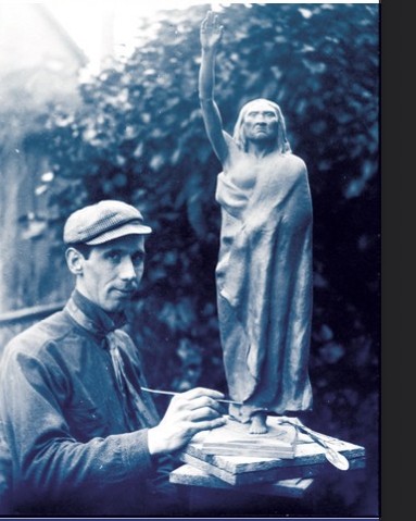 Photograph: James Wehn with clay model of Chief Seattle statue, 1907. Washington State Historical Society collection.
