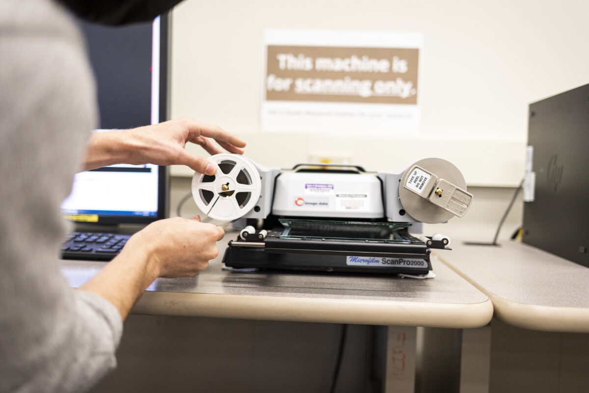 Putting a microfilm on a reader