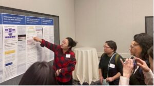 Lucy presenting poster